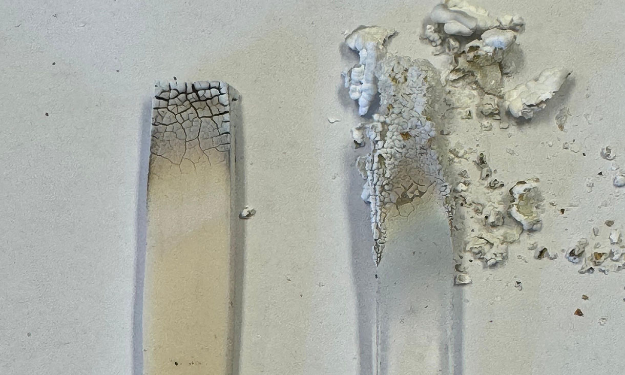 Side-by-side comparison: The team's proposed power pole insulation material (left) next to silicone following a fire-resistance experiment. Credit: Supplied by the research team