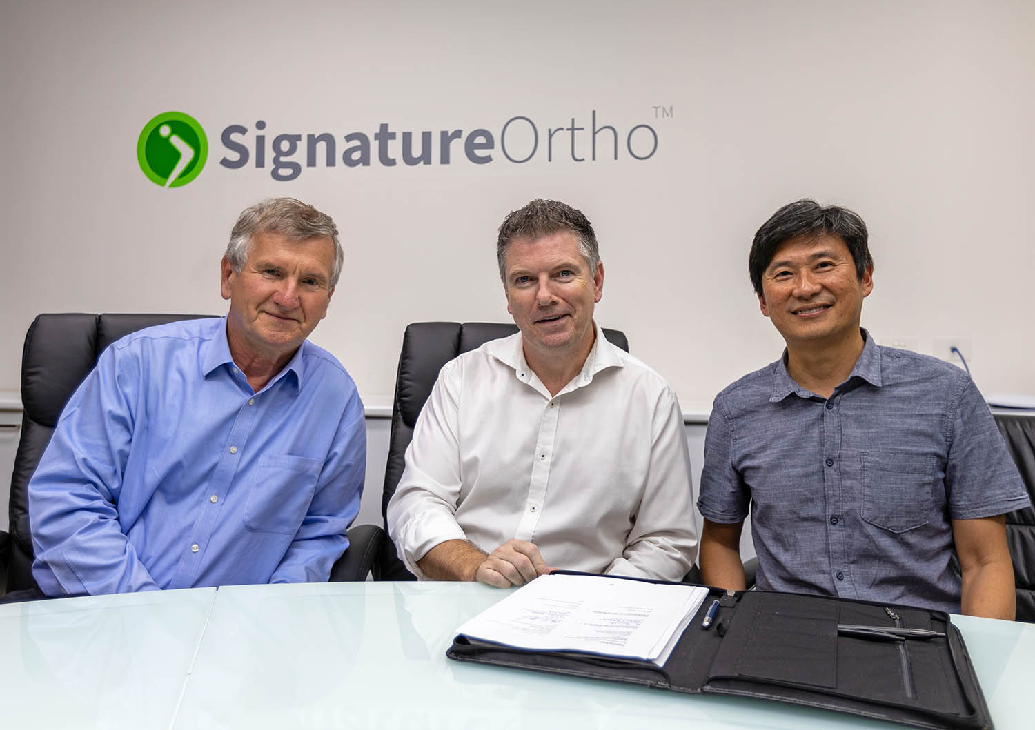 Distinguished Professor Milan Brandt, Dr Declan Brazil and Professor Peter Lee signing the three-way partnership.