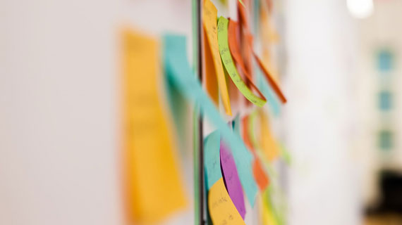 decorative image of sticky notes on wall 