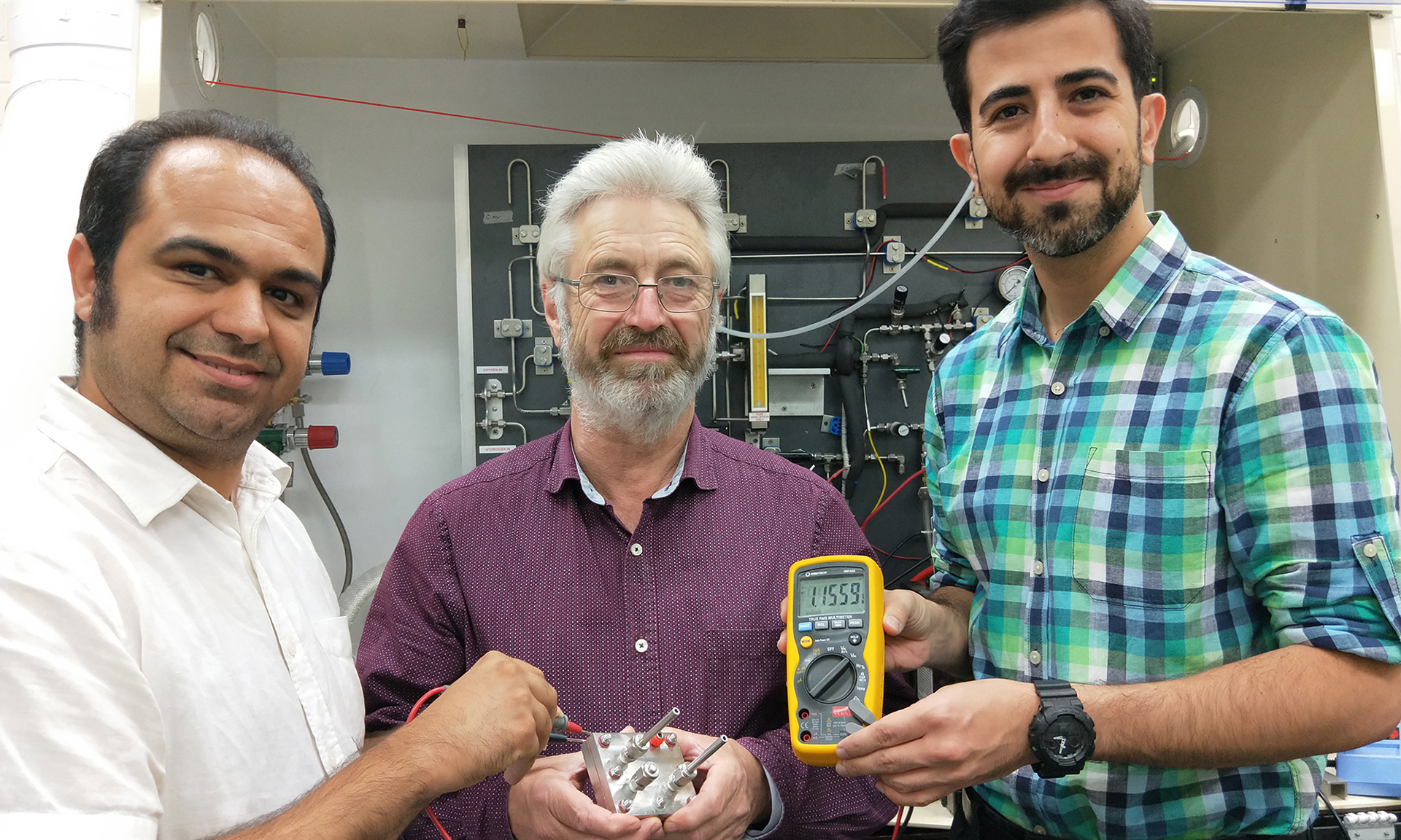 Professor John Andrews (centre) with the RMIT team that conducted the latest proton battery experiments: Dr Shahin Heidari (left) and Saeed Seif Mohammadi (PhD researcher, right). Not pictured: Dr Amandeep Singh Oberoi (now at Thapar University Patiala, India). 