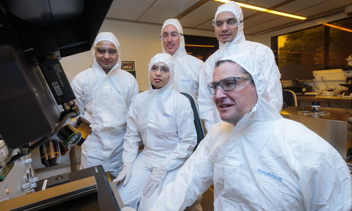 Associate Professor Madhu Bhaskaran (centre) and Senator Zed Seselja (right) with researchers and project partners at the Micro Nano Research Facility. Photo: Mark Dadswell, Sleeptite
