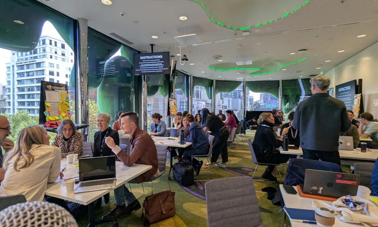 Participants collaborate in groups during the speculative design workshop ‘Thinking with Machines: The AI-Augmented PhD’ at RMIT University’s inaugural GeneratED 2026 conference, hosted by Generative AI Lab for Education (GAILE).