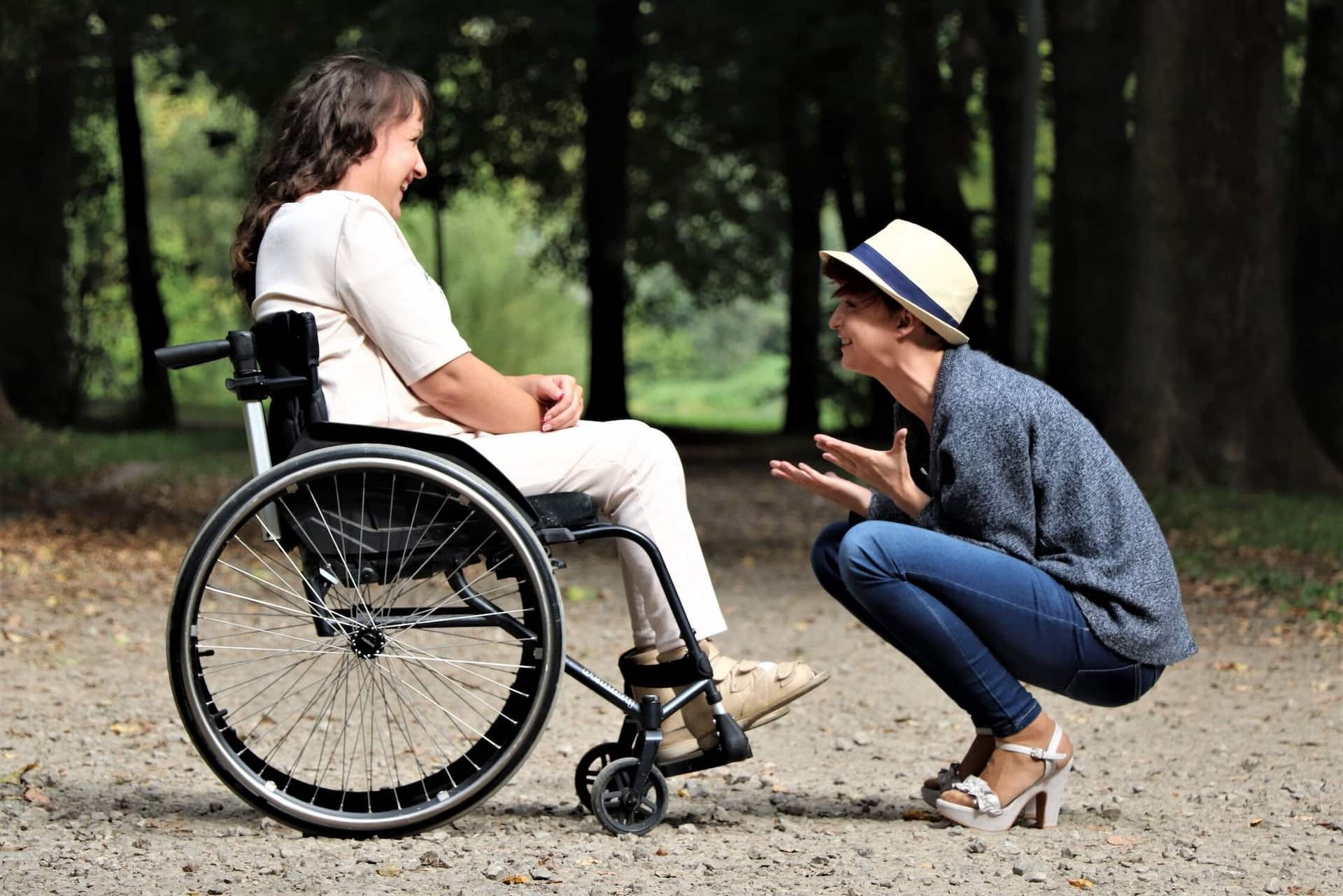 Woman on Black Folding Wheelchair