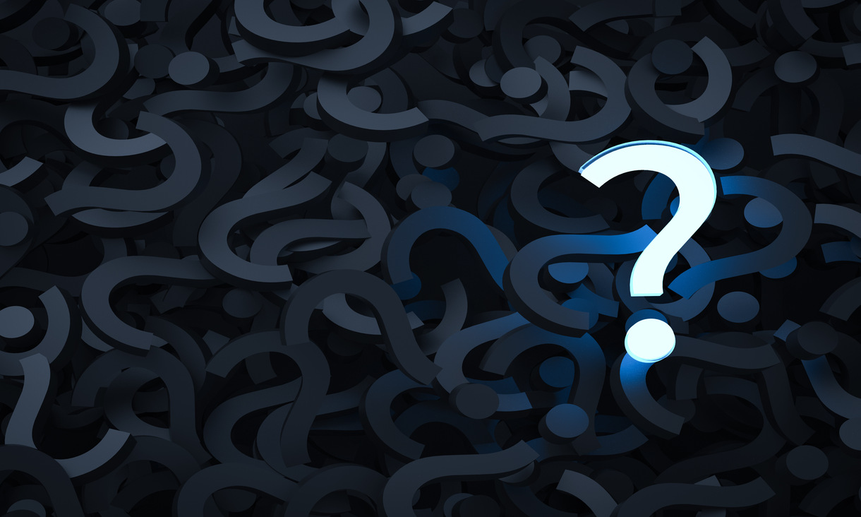 image of white question mark against a background of black question marks