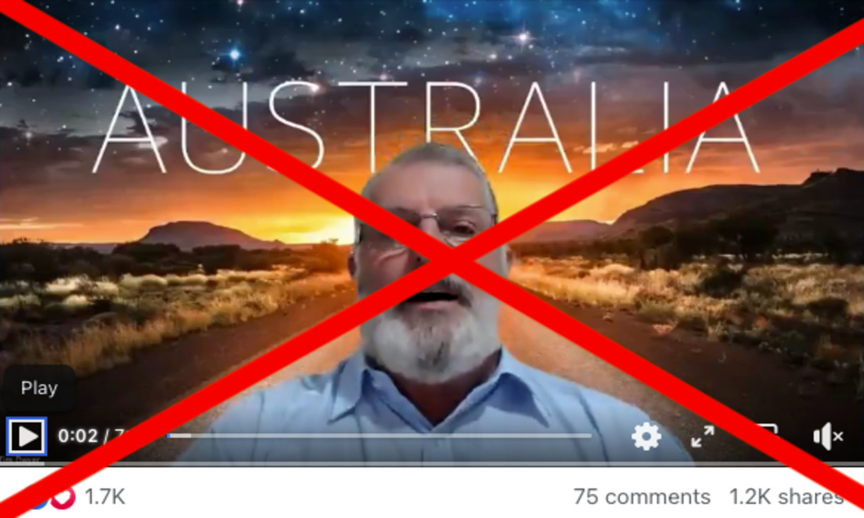 screenshot of video showing man in blue shirt against a landscape of Australia with red cross through the image