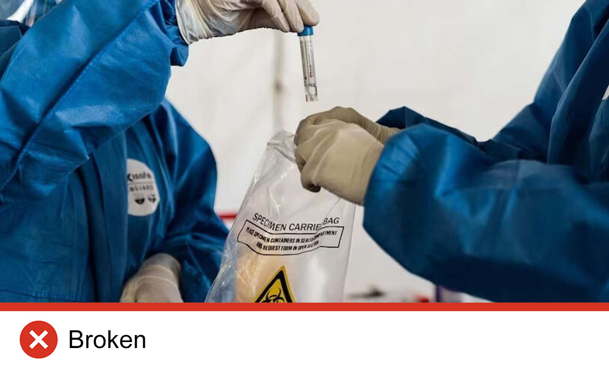 Someone putting a specimen in a plastic bag