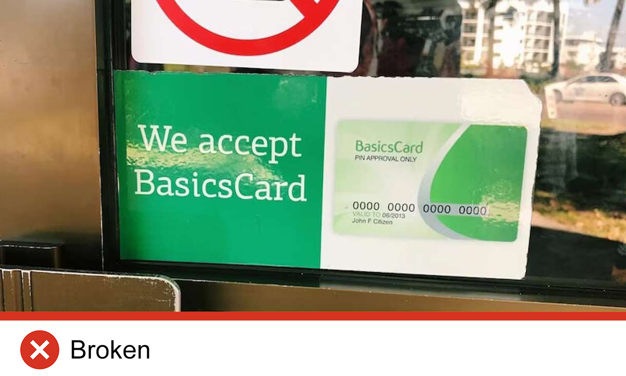 Sign saying 'we accept basics card'