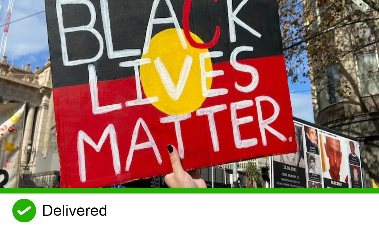 Person holding up Black lives matter sign