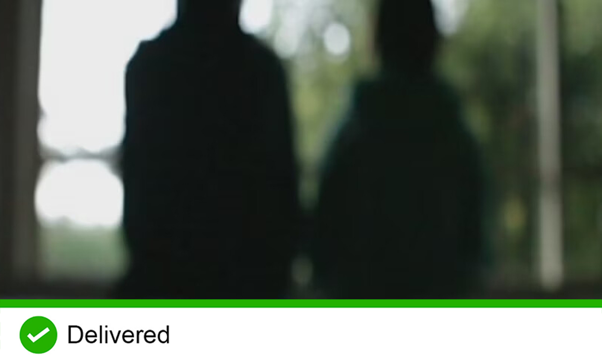 Two blurry silhouettes