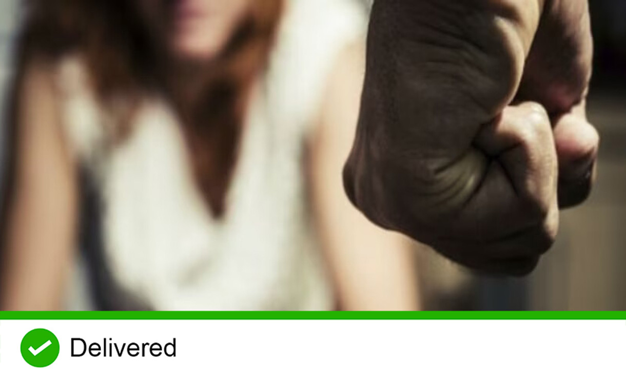 A fist in front of a blurry figure