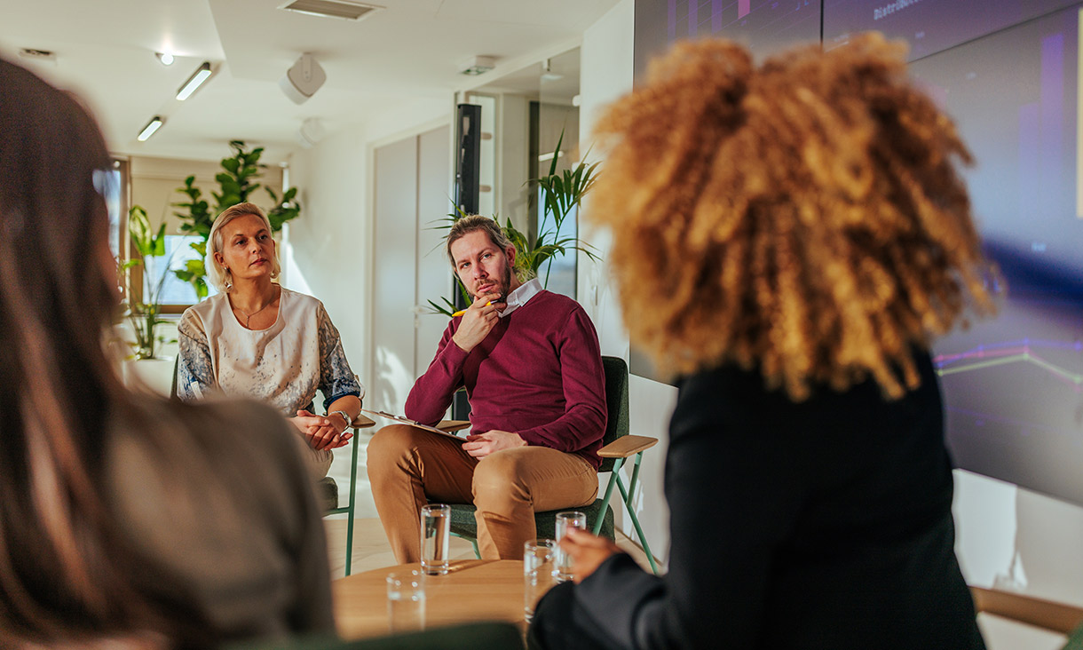 People talking in a meeting room