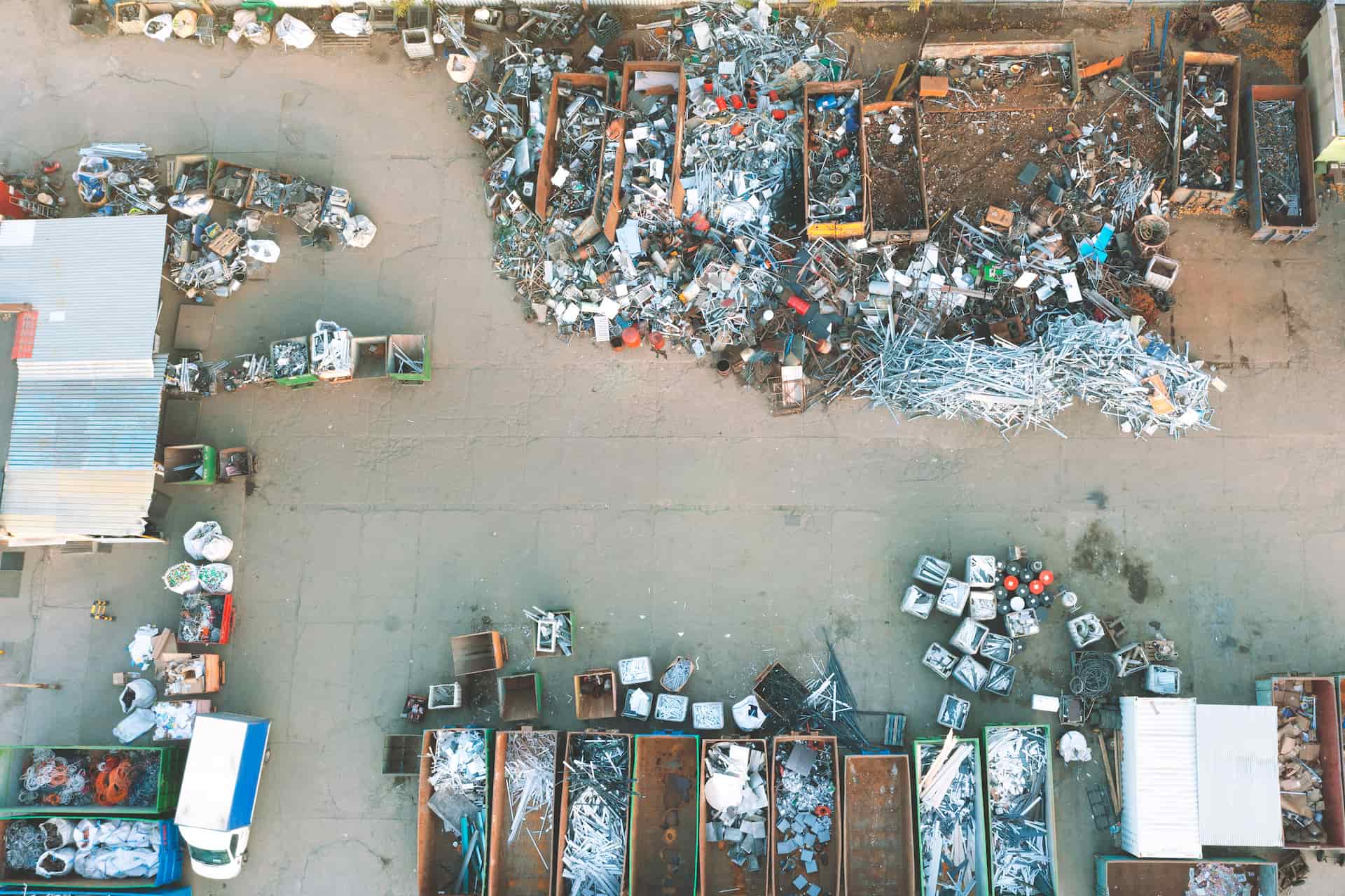 Containers from a height with different types of metal, Sorting for remelting metal products