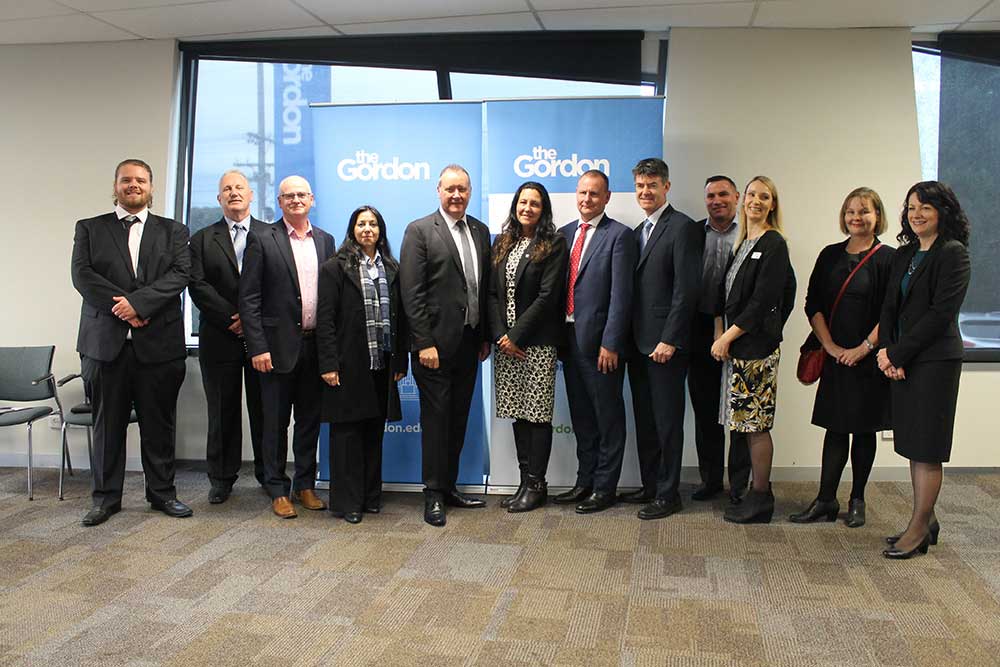 RMIT partners with Civil Contractors Federation (Victorian Branch) in the evaluation of a Civil Skills Cadetship program. Pictured (l-r): Jake Birch (Centre of Excellence in Earthmoving), Rob Garrard (CCF), Malcolm Le Lievre (Brilliant Fit),  Faye Doherty (CCF), John Kilgour (CCF), Christine Couzens (MP Geelong), Barry Smith (Lendlease), Ross Kelly (William Adams),  David Broadhurst (CodeSafe), Keelie Hamilton (The Gordon Institute), Dist. Prof. Helen Lingard (RMIT), Lisa Line (The Gordon Institute).