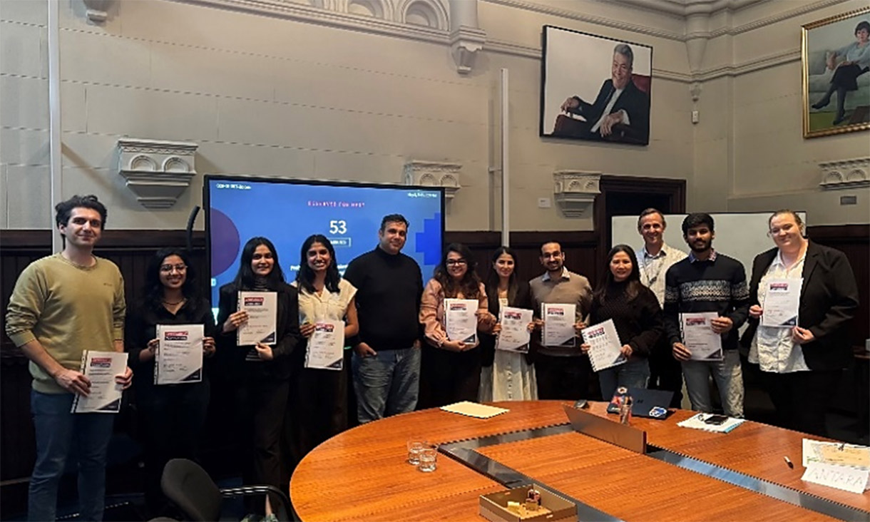 Students’ end of event group photo with their certificates of completion.
