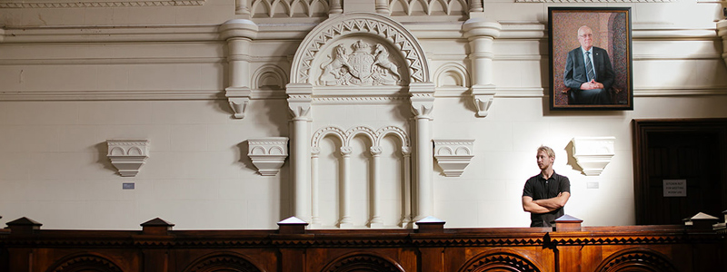 Photo of Law Alumnus Ben Hoopman in RMIT Courtroom