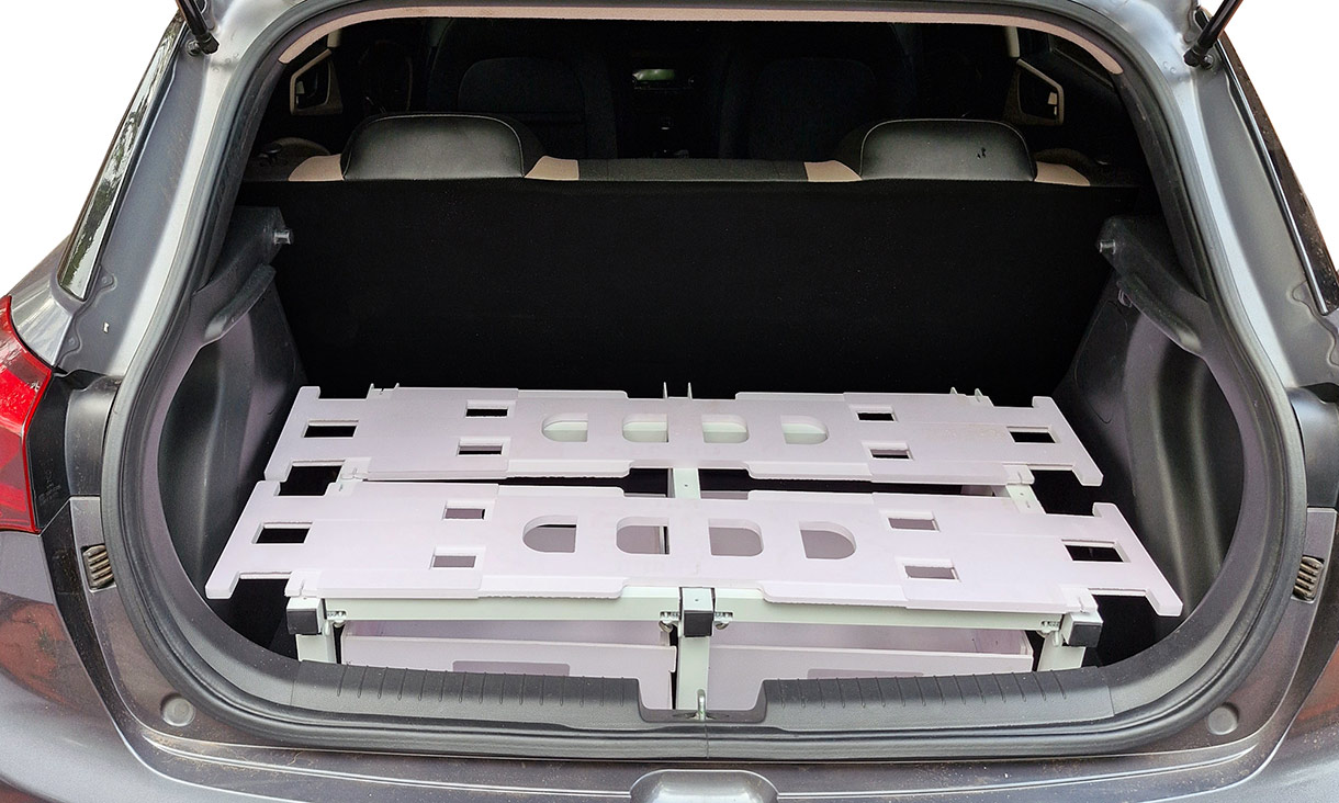 Camperor, a portable camping box, in the boot of a car
