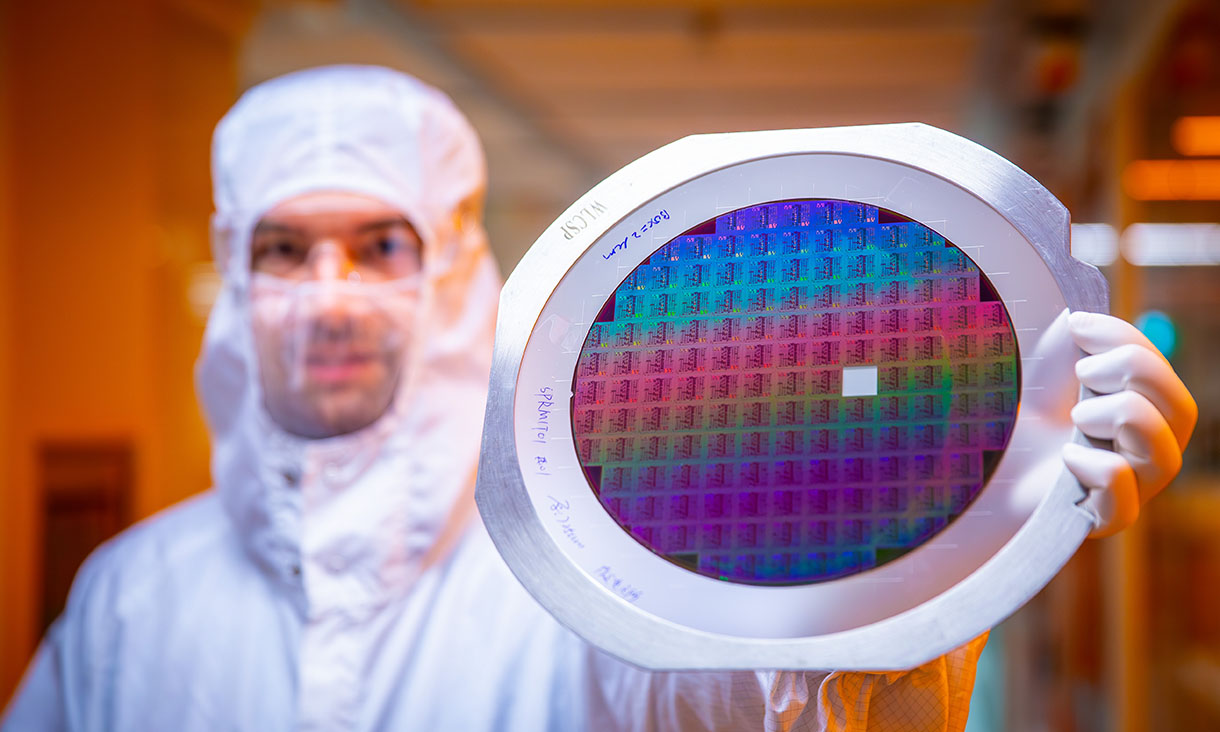 Dr Crispin Szydzik with photonic biosensor wafer