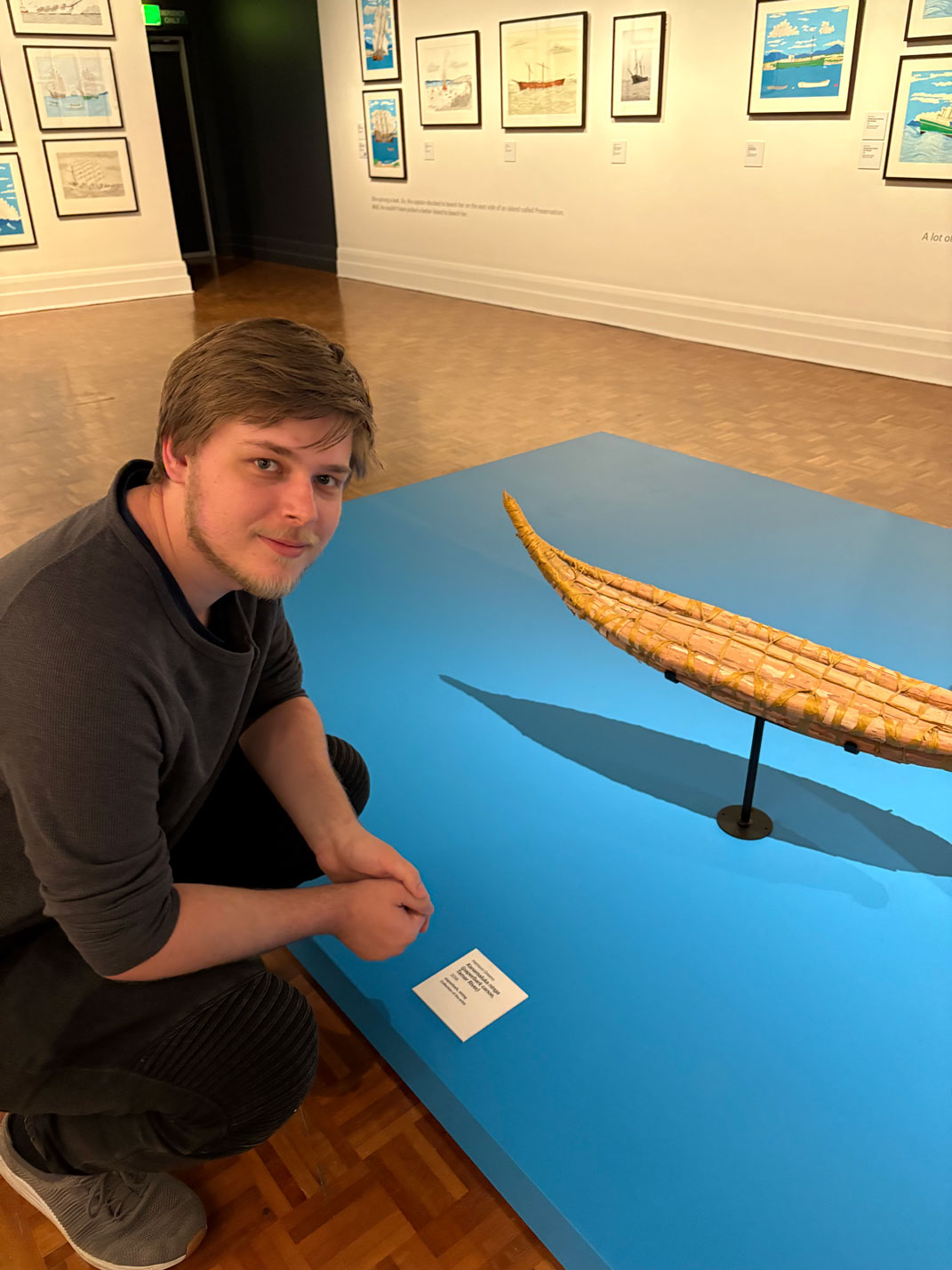 Harrison with the bark canoe he made with his late grandfather Rex Greeno.