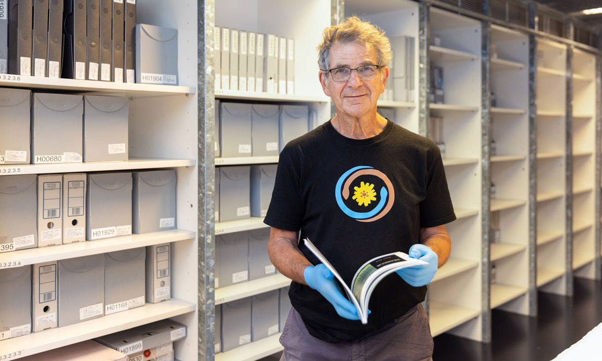 A passion for design: Tony Isaacson in the RMIT Design Archives with some of the architecture and design treasures that have been digitised.