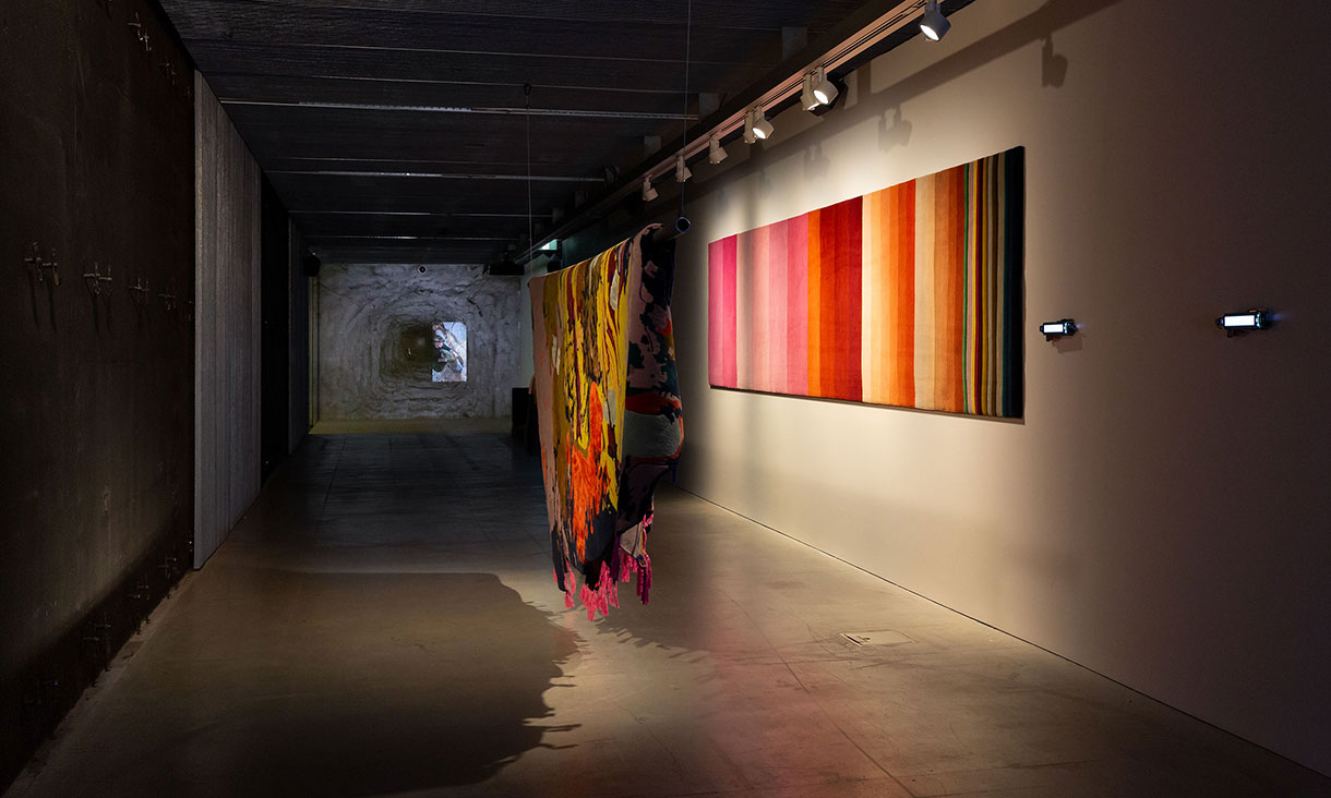 Installation view of works by Emma Jackson (foreground) and Joel Sherwood Spring (background), in Deep Time Real Time, RMIT Design Hub Gallery, Carlton, 2025. 