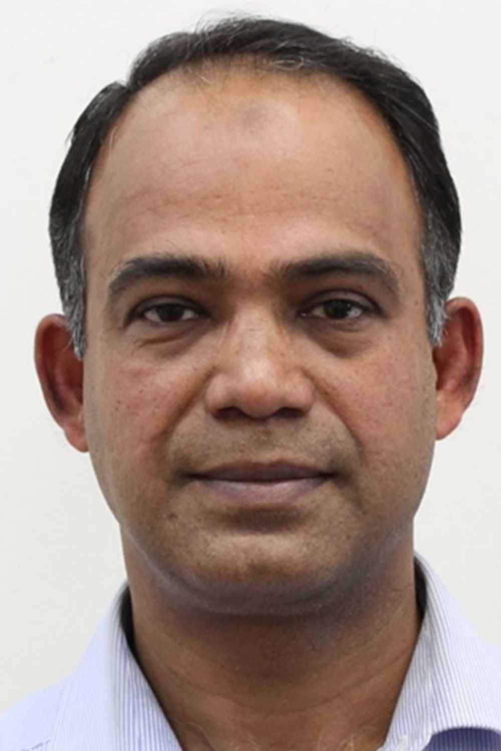 Portrait of Delwar Akbar