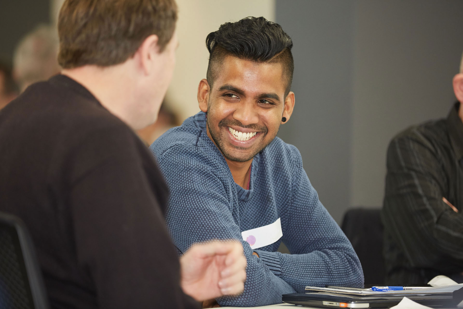 Activator workshop. Two guys talking.