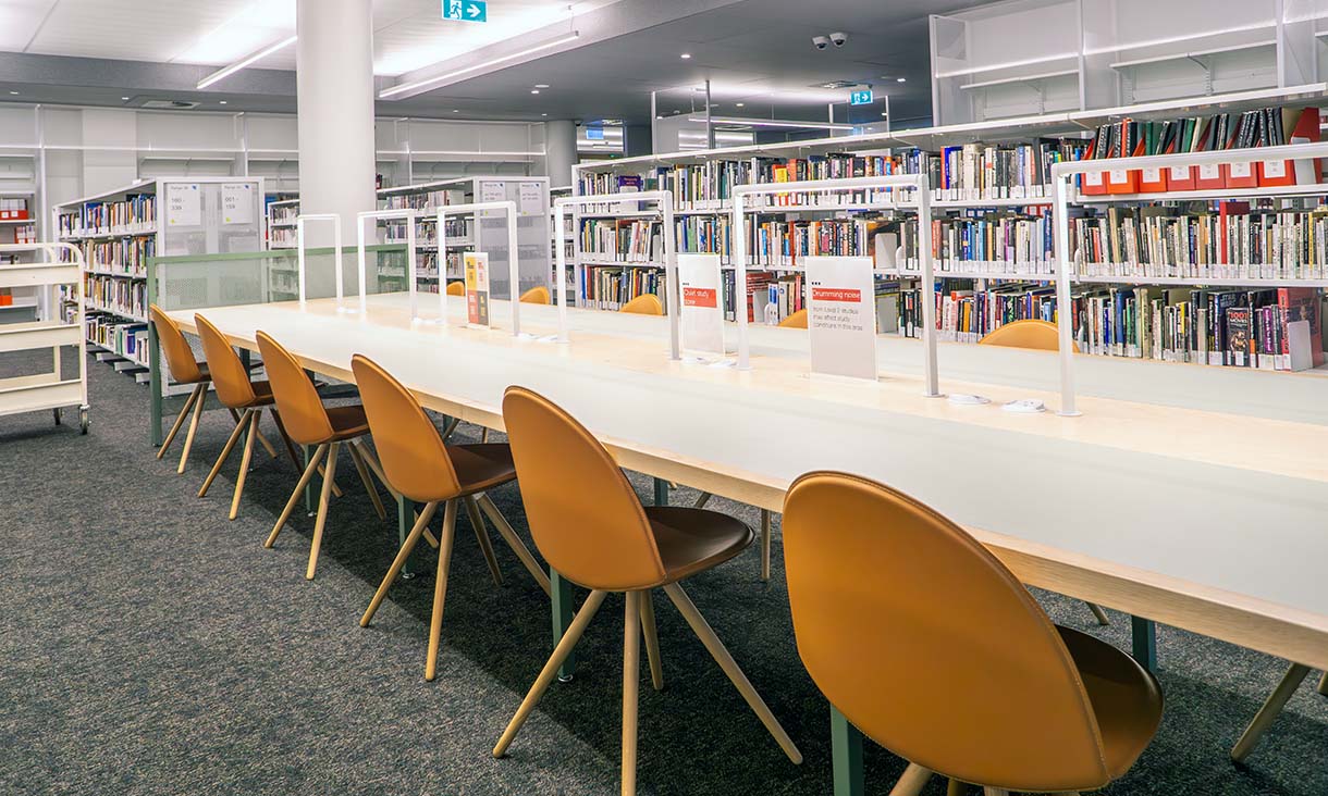 Carlton Library - large study table inside the collection area.