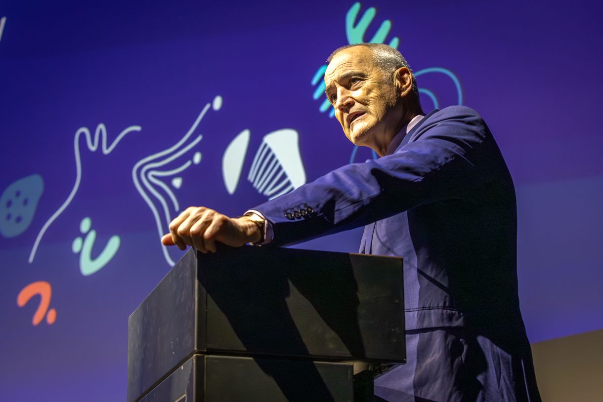 RMIT Vicec-Chancellor Professor Alec Cameron on stage at the launch.