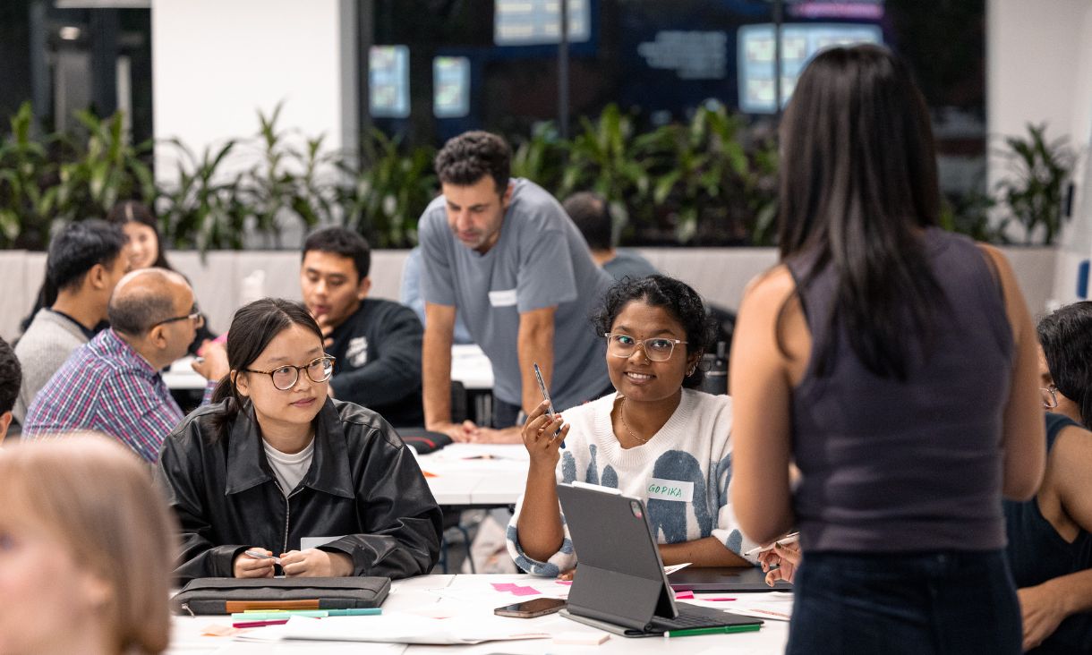 Participants collaborate during a workshop at RMIT Activator's startup co-working space. 