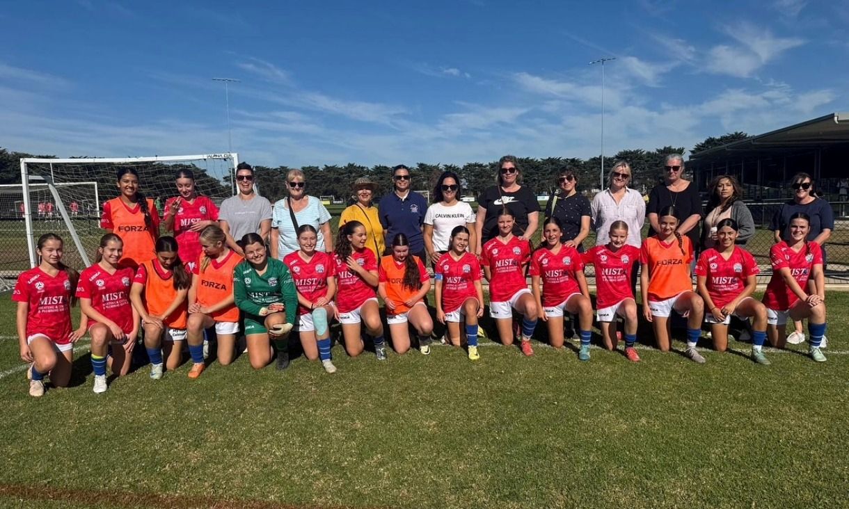 North Geelong Warriors FC junior team with parents