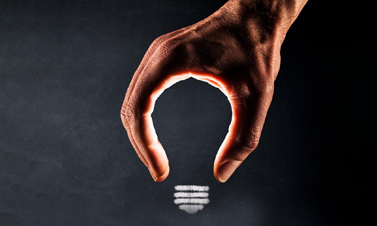 Close up of crystal globe resting on grass in a forest - environment concept 