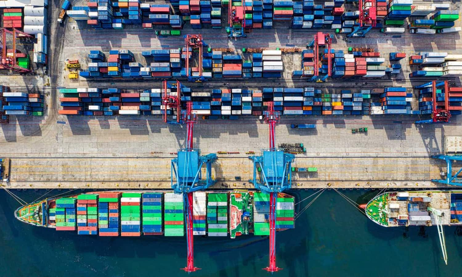 Shipping containers next to sea
