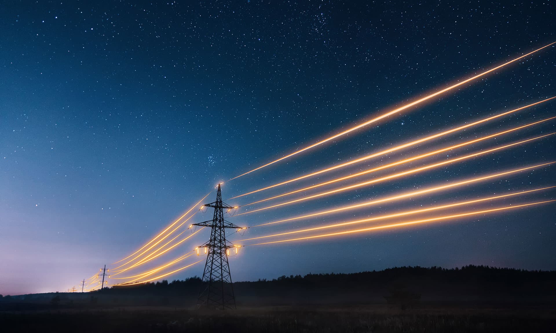 Electricity transmission towers with orange glowing wires the starry night sky. Energy infrastructure concept.