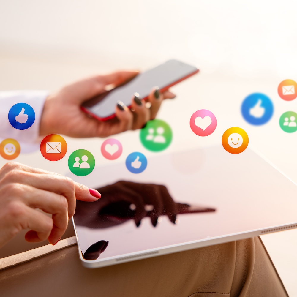 Illustrated woman points to her profile onscreen with a pencil