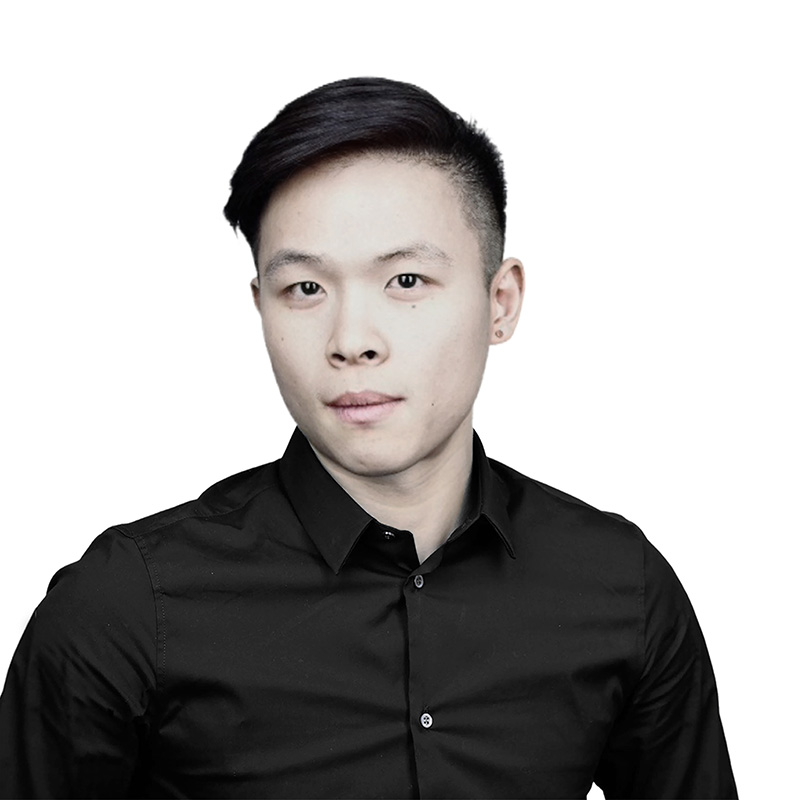 Headshot of Nic Bao. He wears a black shirt.