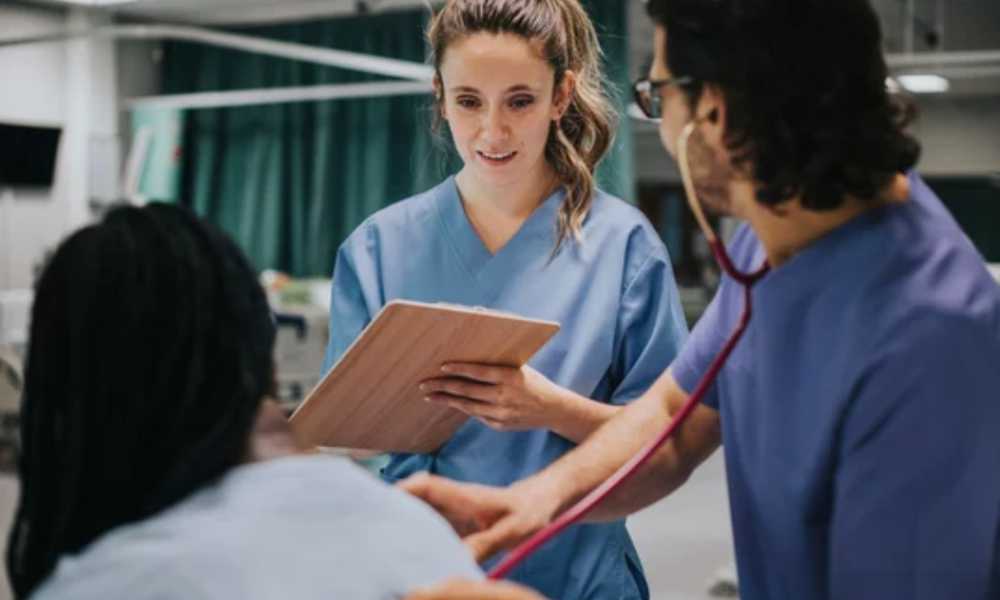Nurse carrying a clipboard 