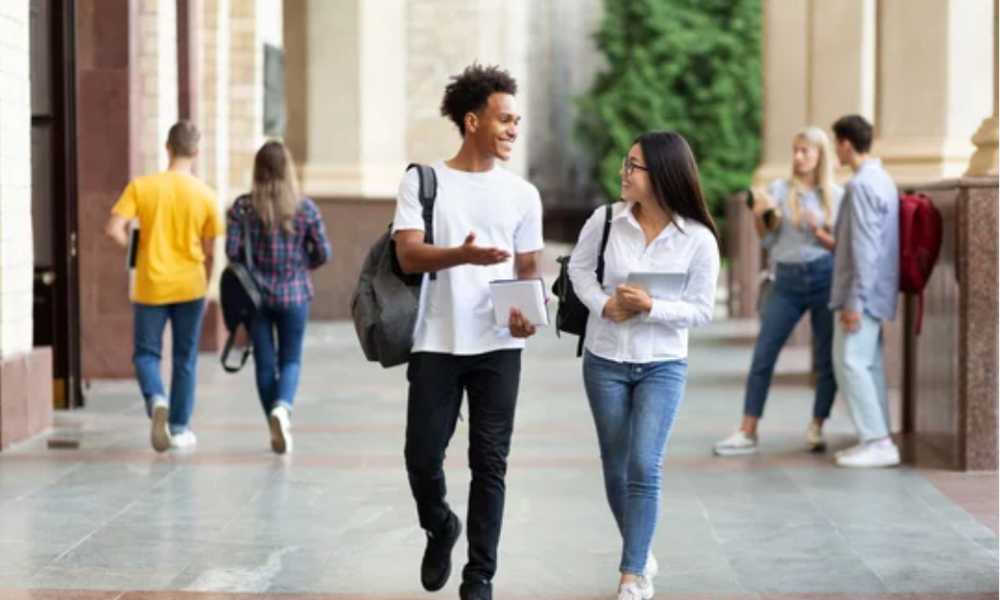 Two students talking to each other 