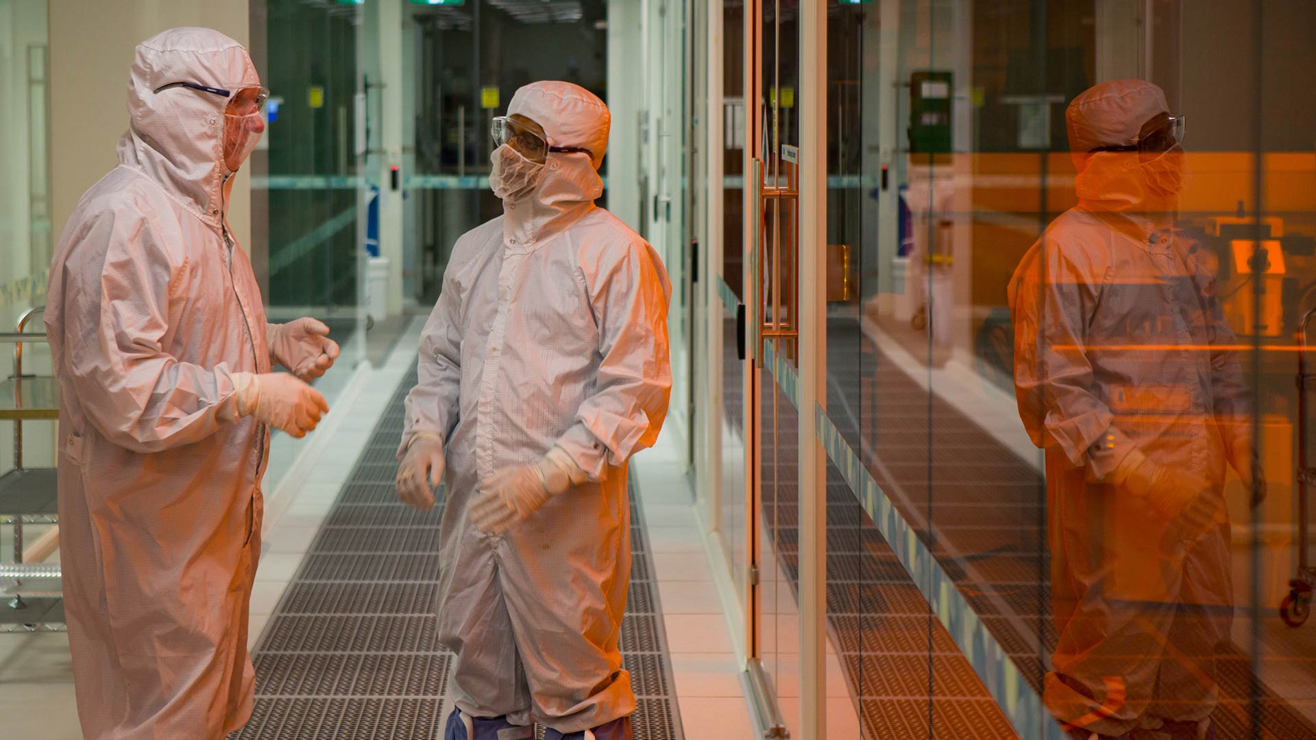 Image people in white personal protective equipment