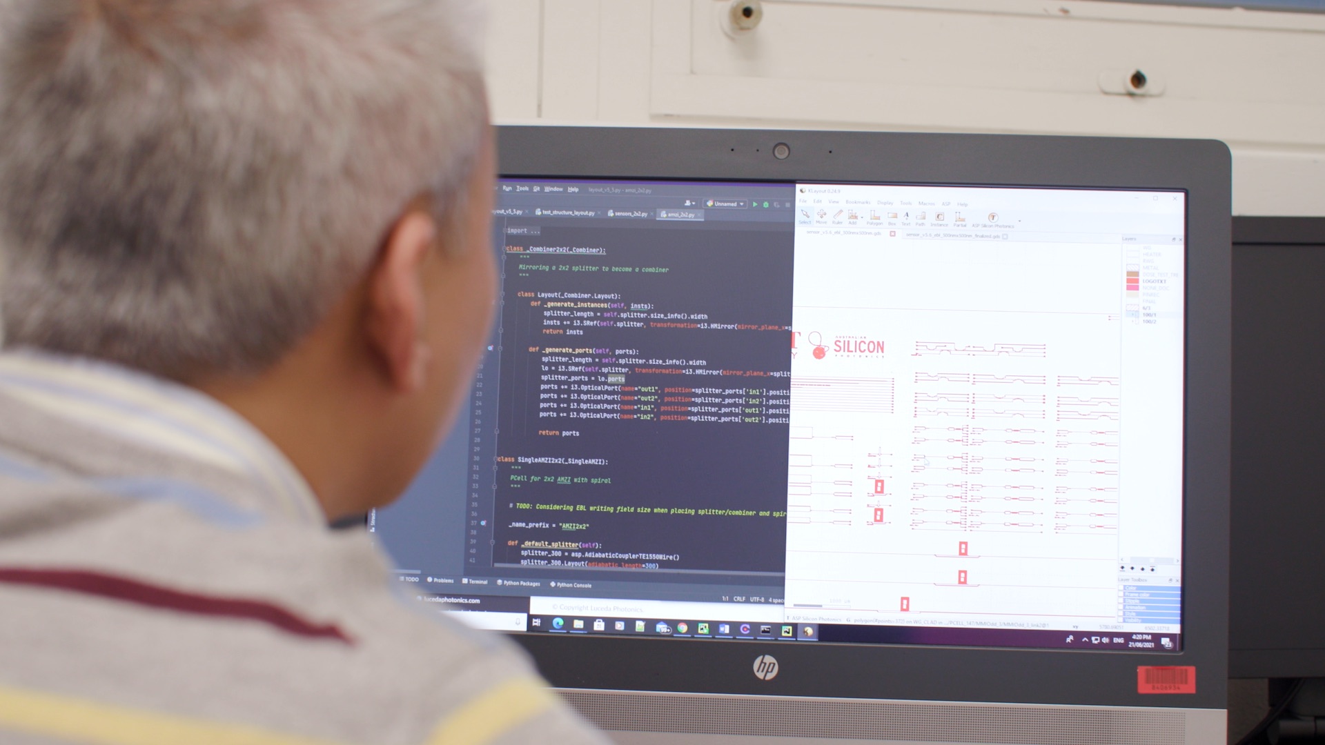 Associate Professor Thach Nguyen  programming code on a computer
