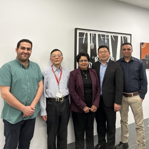 Group photo of five people