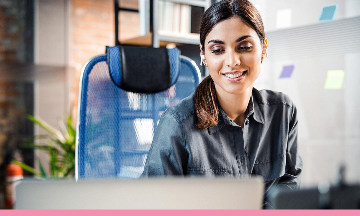 A woman uses her laptop.