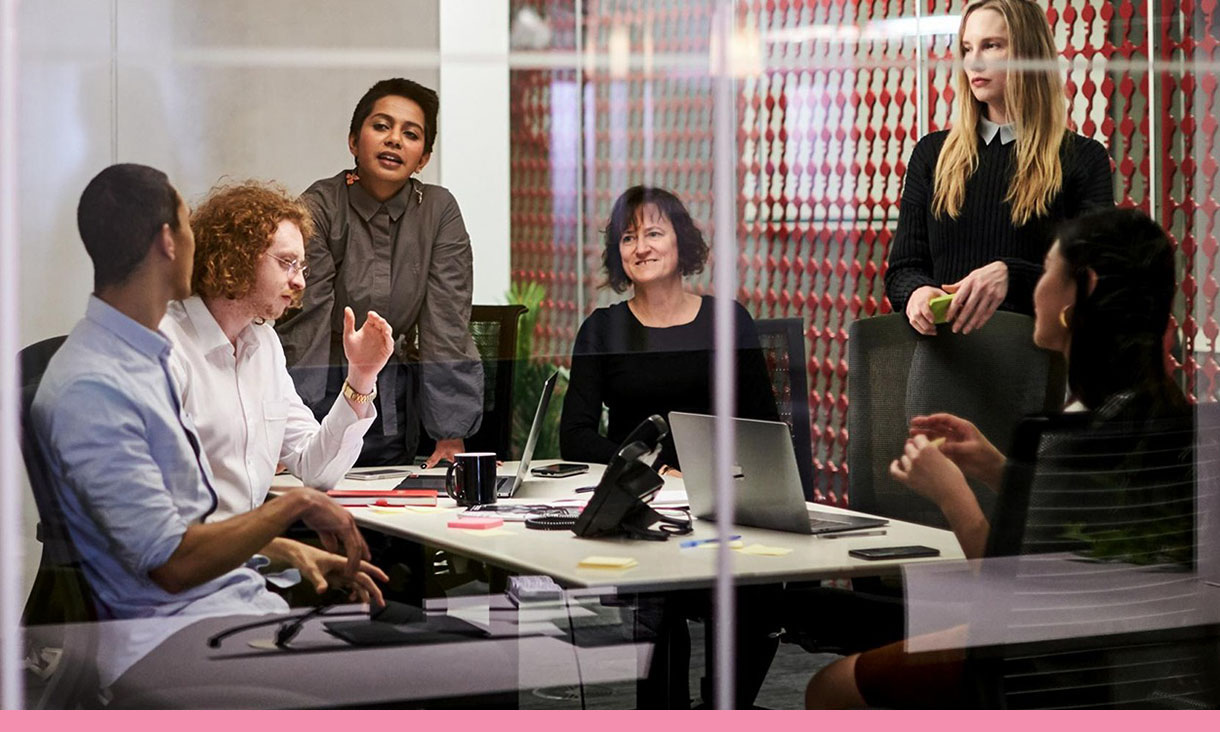 A group of people in a meeting.