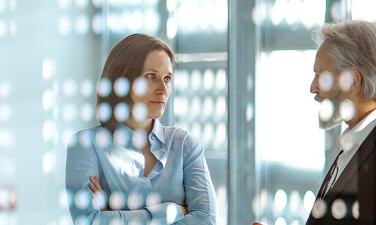 Two managers in conversation.