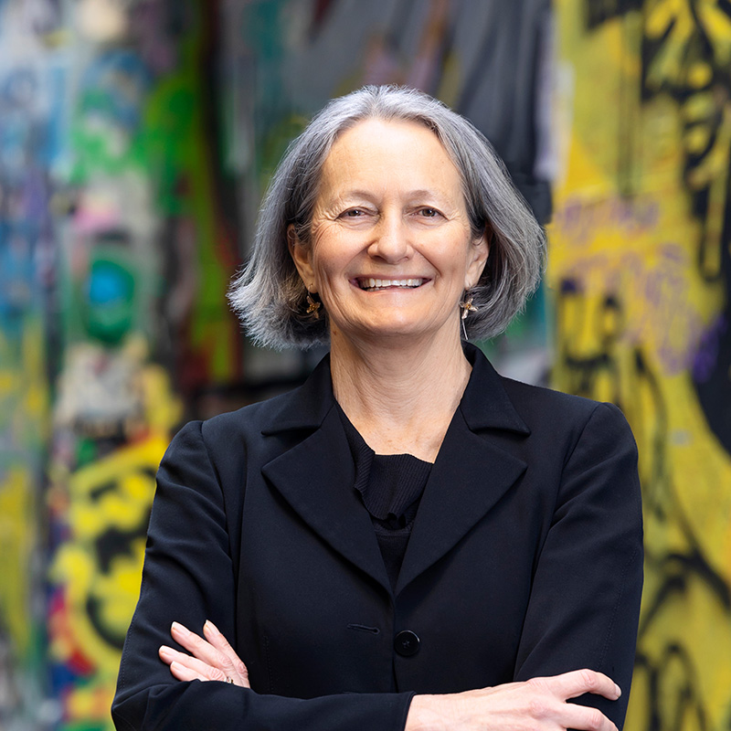 Portrait of Tracy Taylor in a city laneway