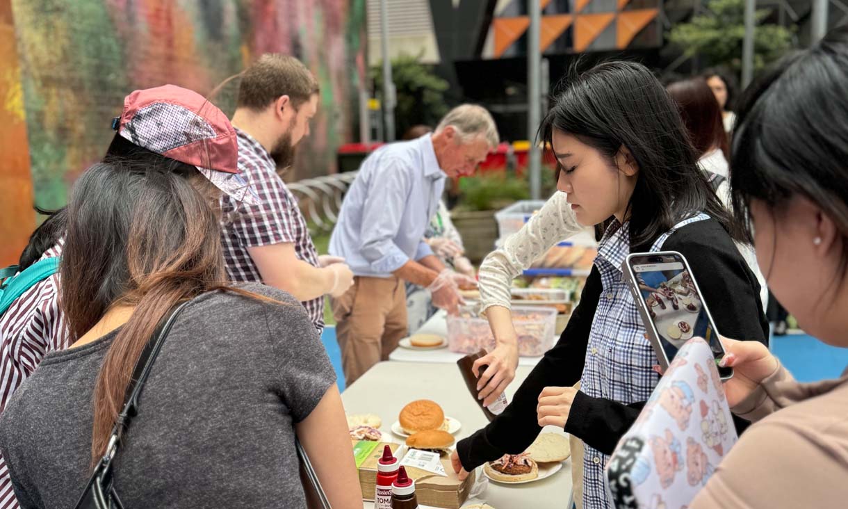 Group of people having lunch outdoors