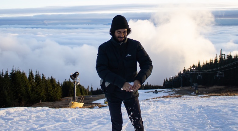Student standing in the snow