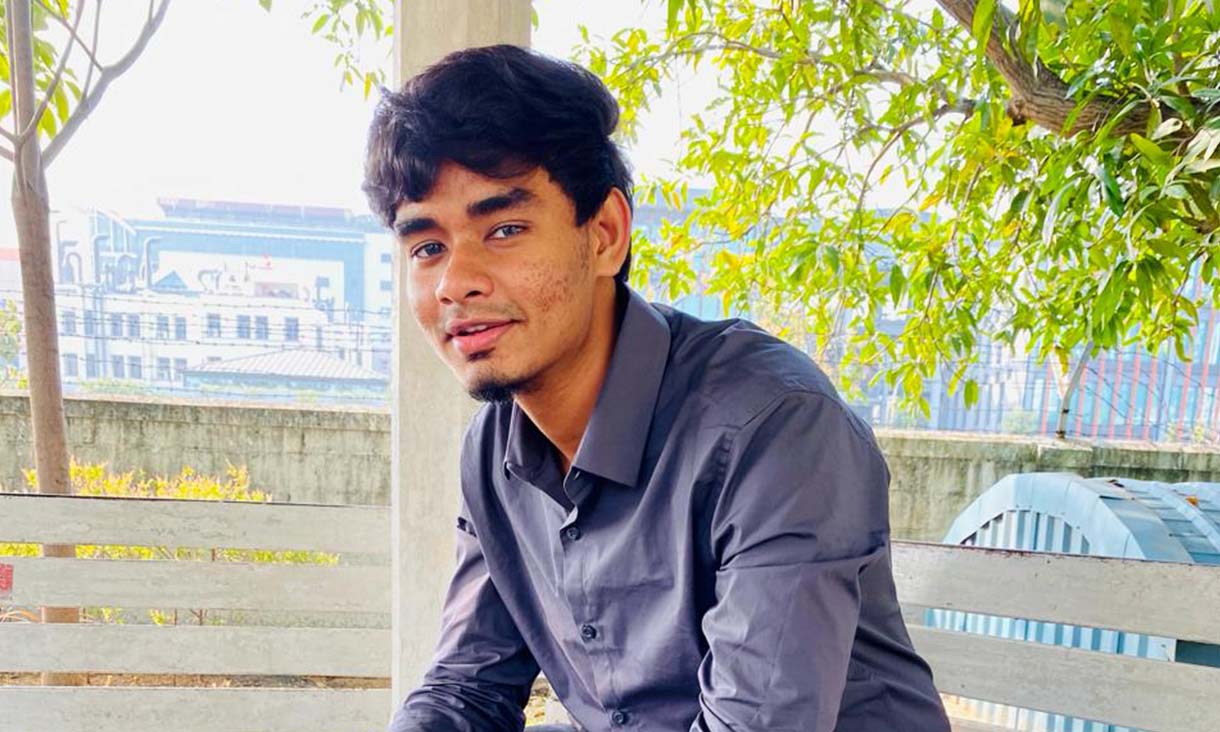 Elvin posing for a photo