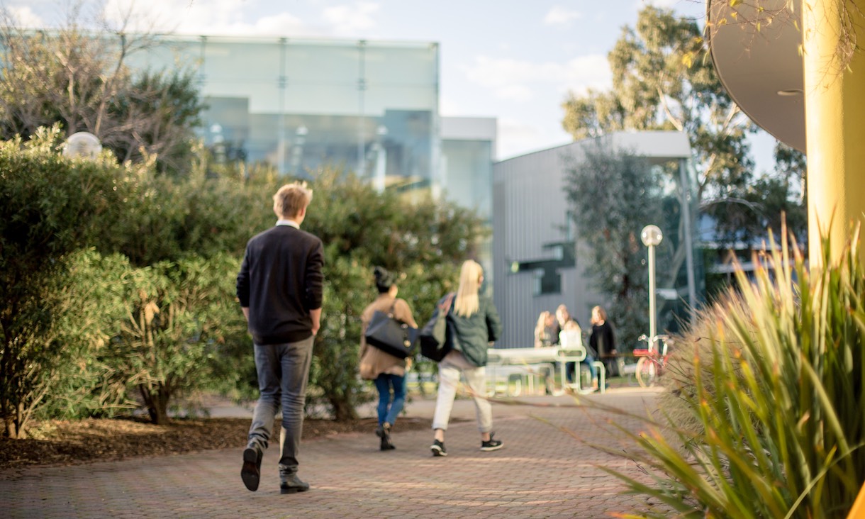 A student walks across Brunswick campus.