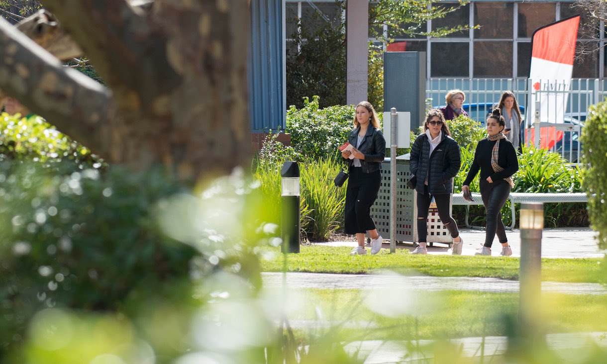 Students walking on campus.