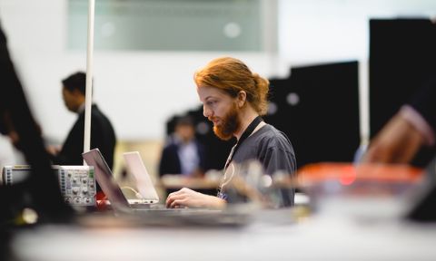 A student works on a computer.
